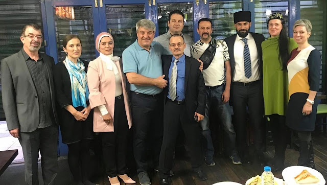 Participants gather for a meeting concerning East Turkestan.